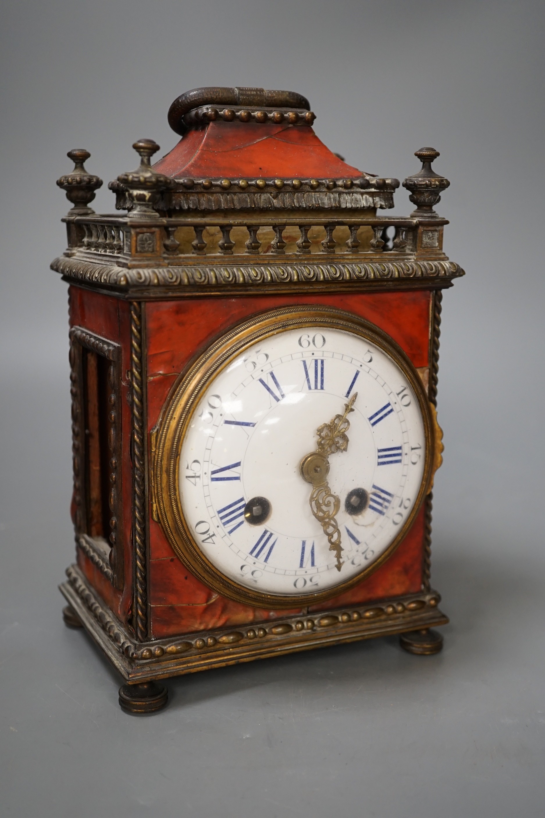 A 19th century French tortoiseshell mantel clock. 24cm high